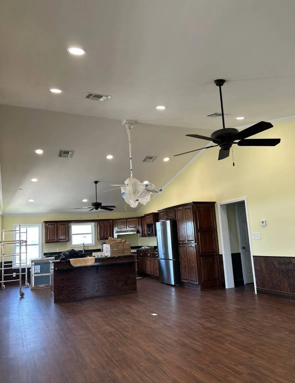 Finished South Louisiana home interior with recessed lighting and ceiling fans